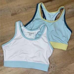 Two sports bras with mesh back